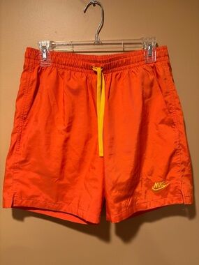 Nike Orange Athletic Shorts with Yellow Drawstring
